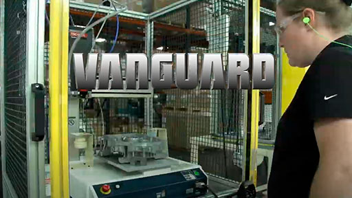 A person manufacturing a Vanguard v twin vertical shaft engine.