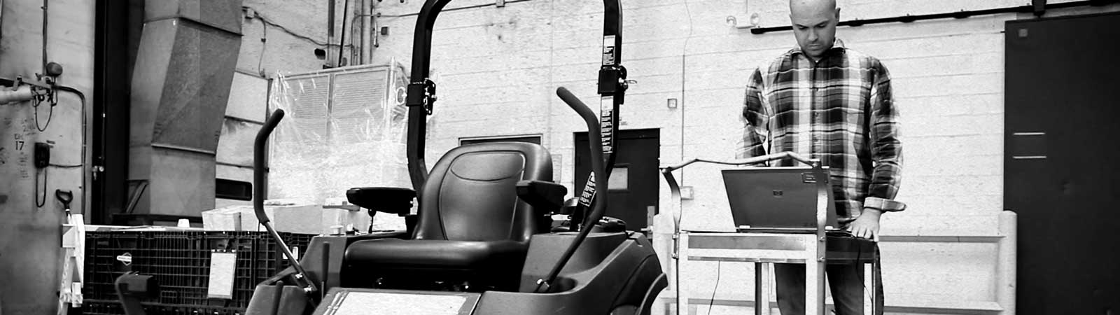 Distributor standing next to equipment powered by a Vanguard engine